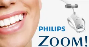 Philips Zoom teeth-whitening lamp alongside a smiling mouth